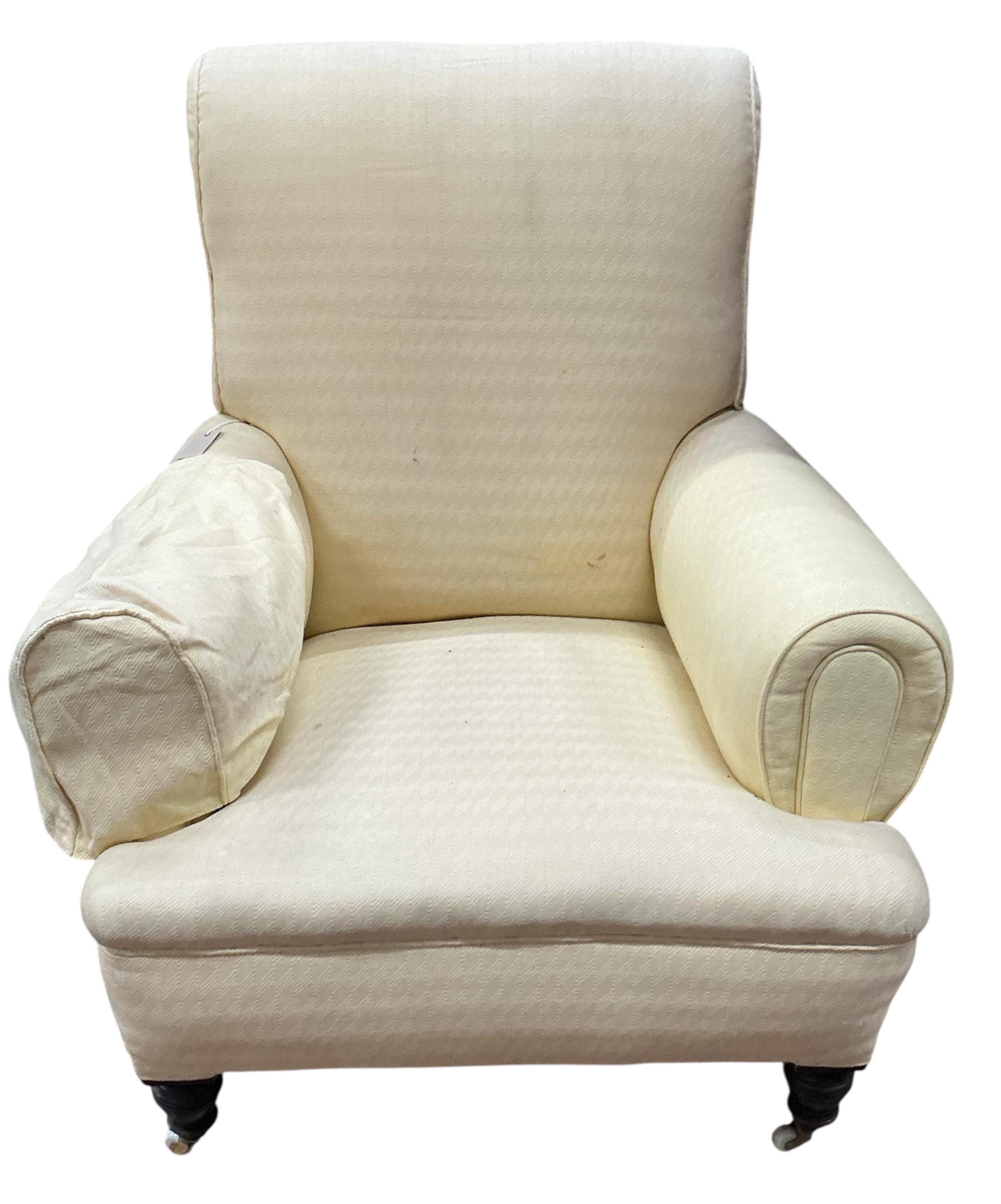 A late Victorian upholstered armchair, width 88cm, depth 80cm, height 100cm